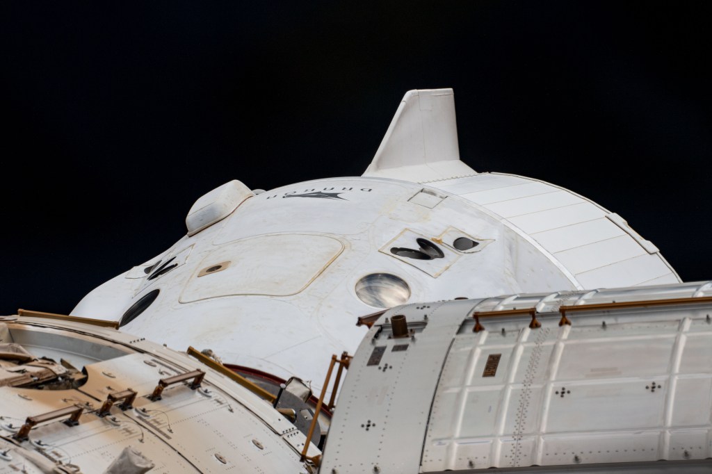 The SpaceX Dragon Endurance crew ship that carried four Crew-3 astronauts to the International Space Station is pictured docked to the forward-facing port of the Harmony module.