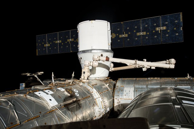 The SpaceX Dragon cargo craft is installed to the Harmony module's Earth-facing port a few hours after it was captured by astronauts David Saint-Jacques and Nick Hague with the Canadarm2 robotic arm.