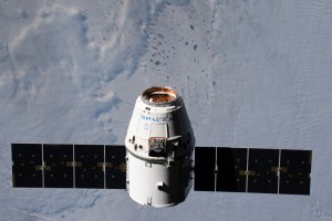The SpaceX Dragon resupply ship approaches the International Space Station as both spacecraft were orbiting 261 miles above Kazakhstan.