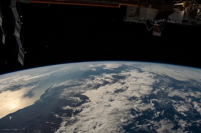 The sun's glint beams off the Mozambique Channel in this photograph of Madagascar's coast as the International Space Station orbited 262 miles above the Indian Ocean.