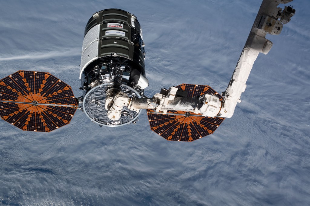 The U.S. Cygnus space freighter is pictured moments after NASA astronaut Jessica Meir, with fellow Flight Engineer Christina Koch as her back up, commanded the Canadarm2 robotic arm to reach out and grapple the 12th resupply ship from Northrop Grumman.