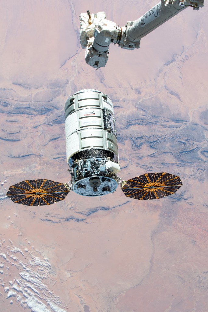 The U.S. Cygnus space freighter approaches the International Space Station carrying over four tons of science experiments, crew supplies and station hardware. The Canadarm2 robotic arm, guided by NASA astronaut Jessica Meir with fellow Flight Engineer Christina Koch as her back up, is poised to capture the 12th resupply ship from Northrop Grumman.