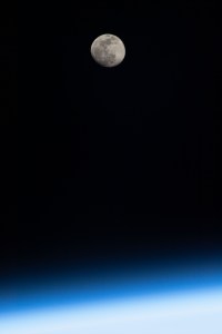 The waxing gibbous Moon is photographed above Earth's horizon from the International Space Station as it orbited 261 miles above Turkey.