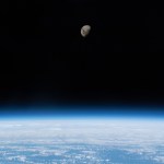 The waxing gibbous moon is pictured above Earth's limb as the International Space Station was orbiting 266 miles above the South Atlantic Ocean.