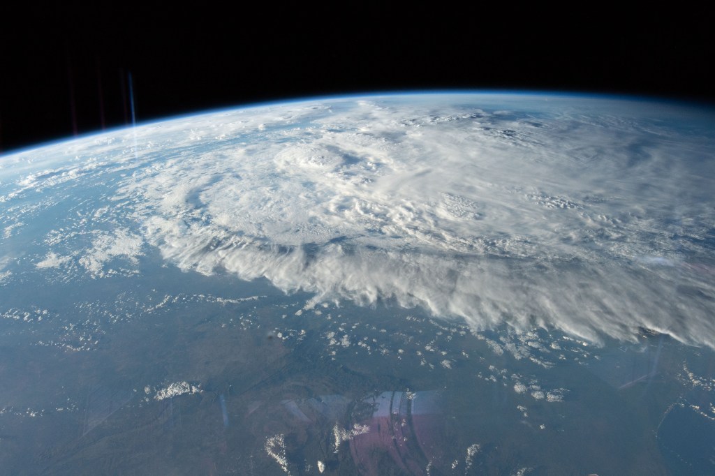 Tropical Cyclone Idai is pictured from the International Space Station as the orbital complex flew 261 miles above the southeast coast of Africa. Idai's track took it over the Mozambique Channel and portions of the nations of Madagascar, Mozambique, Malawi and Zimbabwe creating devastation and casualties in the southeast portion of the African continent.