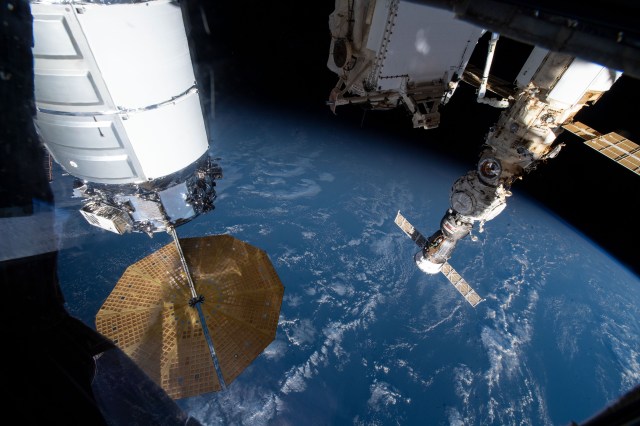 U.S. and Russian spaceships are pictured attached to the International Space Station as it orbited 267 miles above the Indian Ocean south of the island nation of Madagascar. At left, is the U.S. Northrop Grumman Cygnus resupply ship with its prominent cymbal-shaped UltraFlex solar arrays. At right, is the Soyuz MS-21 crew ship docked to the Prichal docking module, which is also attached to the Nauka multipurpose laboratory module. At top center, is the Rassvet module that also hosts Russian visiting vehicles.