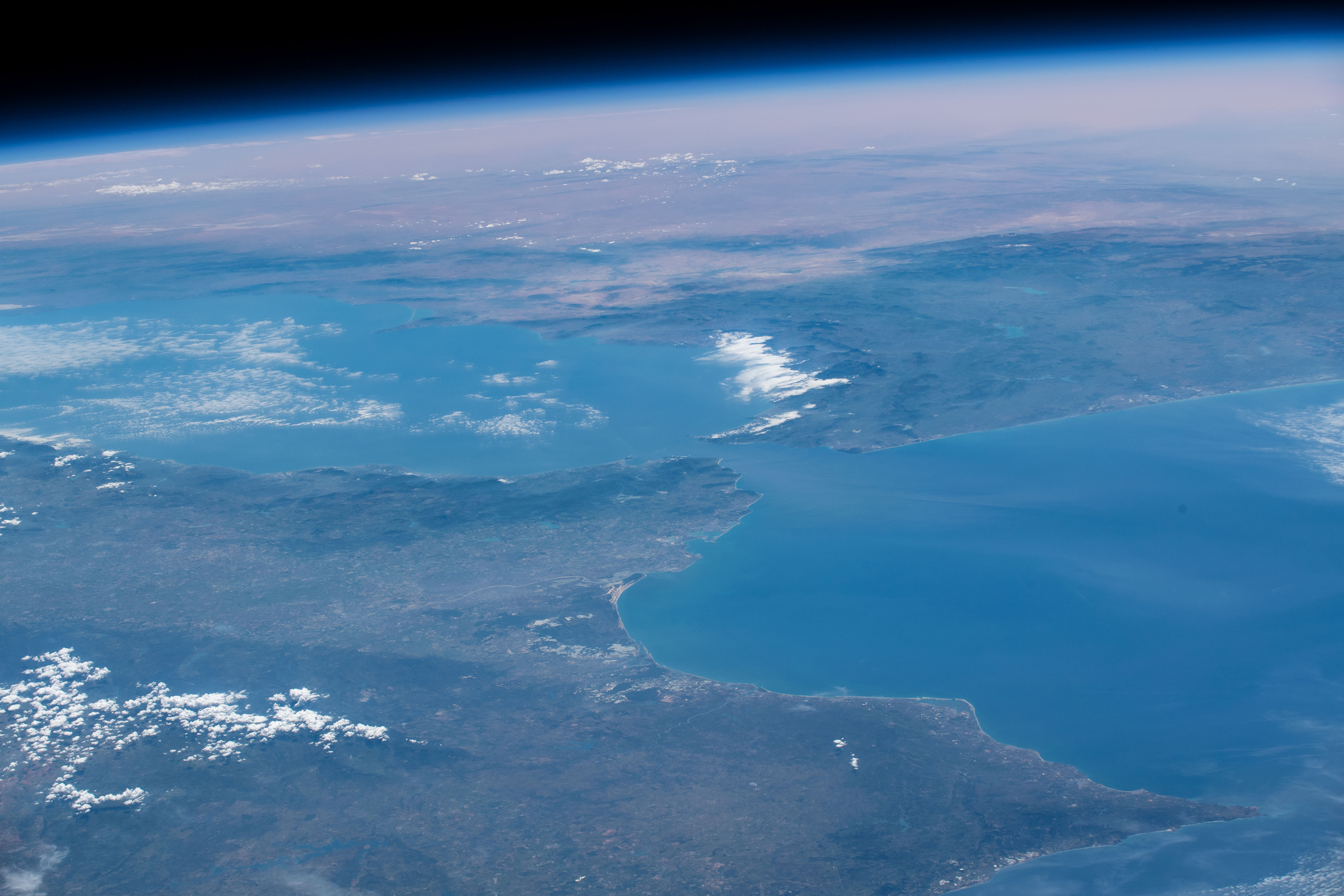 Looking from northwest to southeast (bottom to top), this oblique view shows portions of Western Europe, the Atlantic Ocean, the Mediterranean Sea and North Africa. More specific regions such as Portugal, Spain, the Strait of Gibraltar, Morocco and Algeria are seen as the International Space Station orbited 257 miles above the Atlantic.