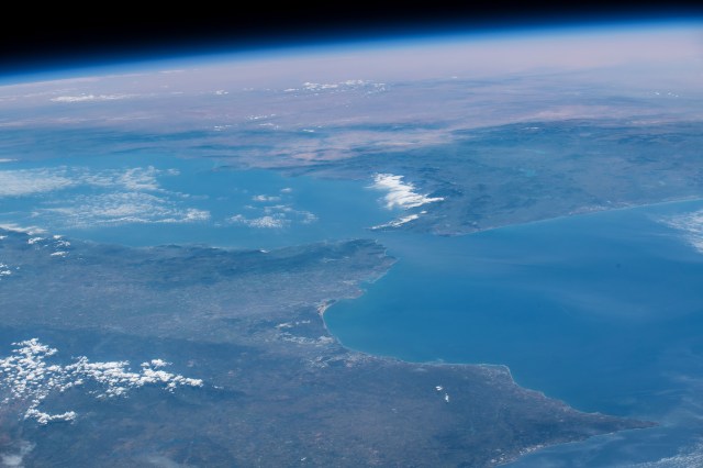 Looking from northwest to southeast (bottom to top), this oblique view shows portions of Western Europe, the Atlantic Ocean, the Mediterranean Sea and North Africa. More specific regions such as Portugal, Spain, the Strait of Gibraltar, Morocco and Algeria are seen as the International Space Station orbited 257 miles above the Atlantic.