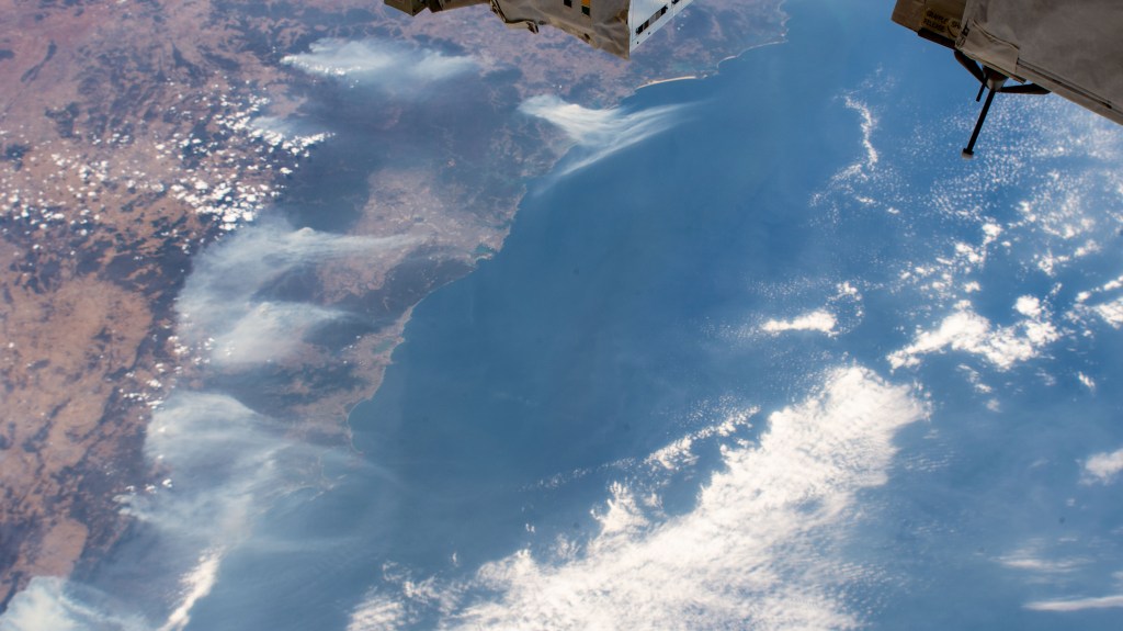 Wildfires are pictured surrounding Sydney, Australia, as the International Space Station orbited 269 miles above the Tasman Sea.