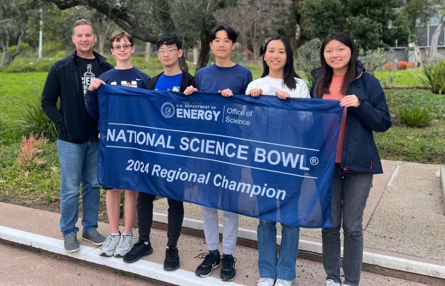The 2024 National Science Bowl regional competition hosted by JPL included 21 schools, with this team from Irvine’s University High School taking first place. From left, coach David Knight, Feodor Yevtushenko, Yufei Chen, Nathan Ouyang, Wendy Cao, and Julianne Wu.