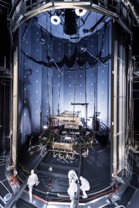 From the outside of the mouth of Chamber A, engineers and technicians prepare the lift system that was used to hold the James Webb Space Telescope during testing ahead of its launch. Credit: NASA/Chris Gunn