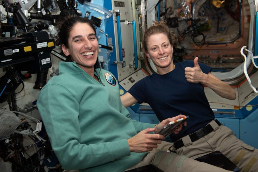 Expedition 70 Flight Engineers (from left) Jasmin Moghbeli and Loral O'Hara, both from NASA, pose for a portrait inside the Destiny laboratory module.
