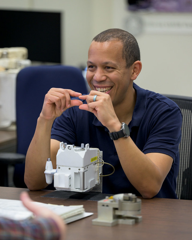 NASA Astronaut Christopher Williams is seen working on extravehicular activity (EVA) hardware at the NASA Johnson Space Center.