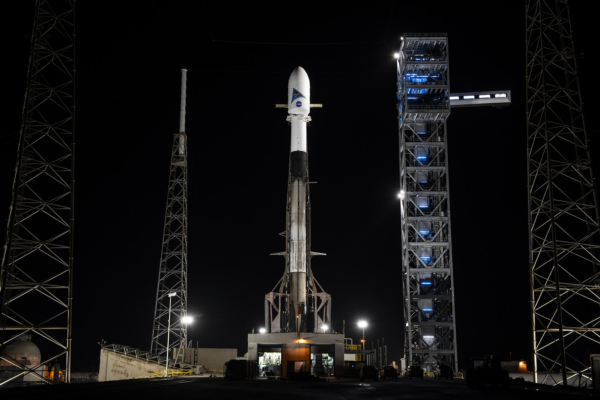 A SpaceX Falcon 9 rocket with NASA's PACE (Plankton, Aerosol, Cloud, ocean Ecosystem) spacecraft encapsulated atop is raised to a vertical position at Space Launch Complex 40 at Cape Canaveral Space Force Station in Florida on Monday, Feb. 5, 2024.