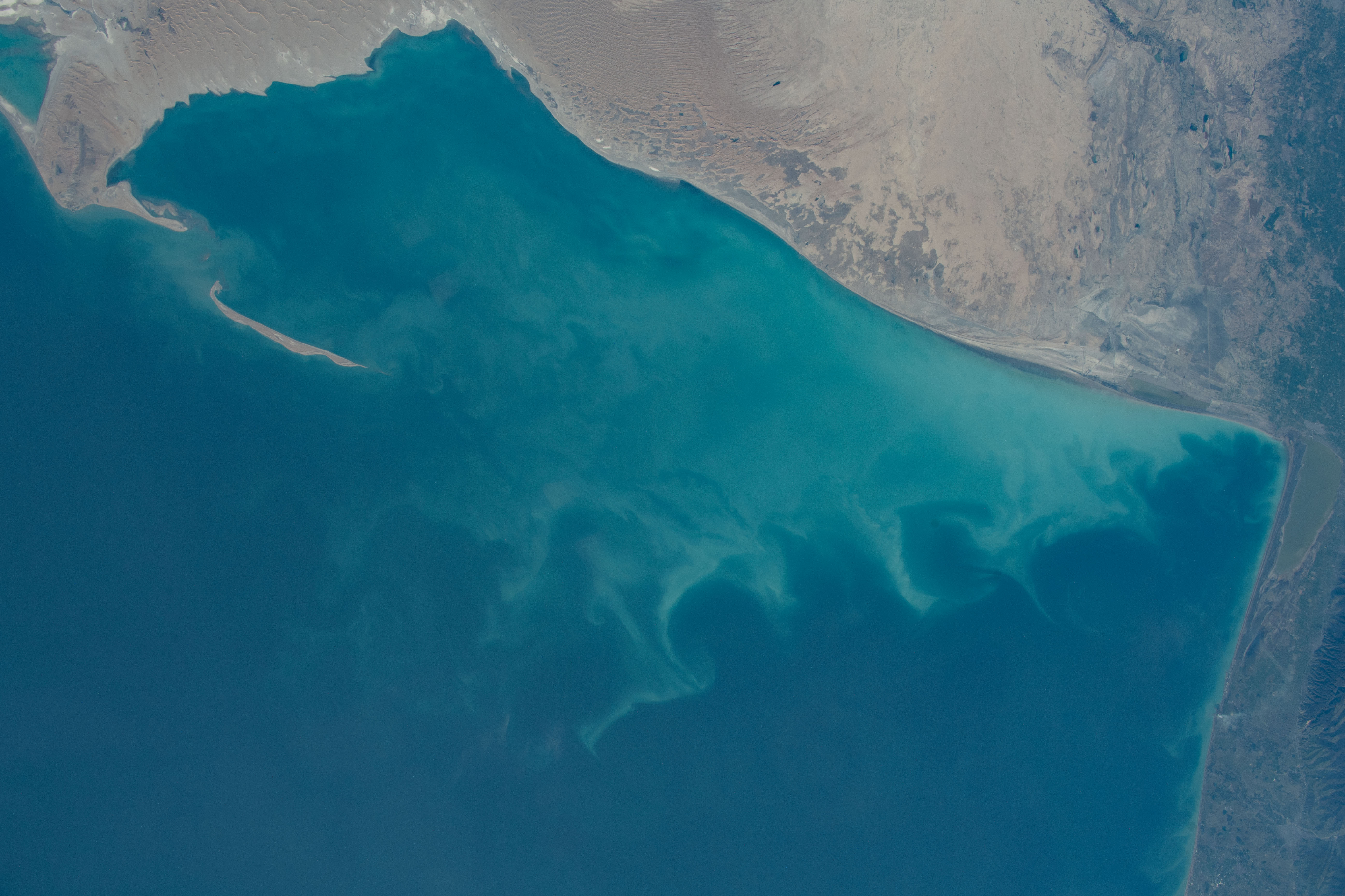 iss070e089989 (Feb. 8, 2024) -- Bordering five countries, the world's largest inland water body, the Caspian Sea, was photographed by NASA astronaut Loral O'Hara as the International Space Station orbited 261 miles above.