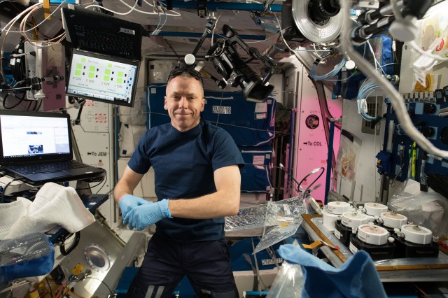 NASA astronaut Drew Feustel is photographed performing Veggie Passive Orbital Nutrient Delivery System (PONDS) operations, including cleaning the Veggie Ponds hardware and Veggie facility and then setting up for drying out in the Columbus module. The primary goal of the Veggie PONDS hardware validation test is to demonstrate plant growth in the newly developed plant growing system.