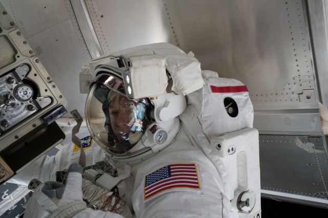 Astronaut Drew Feustel is pictured outside of the International Space Station during a spacewalk on May 16 to swap thermal control gear.