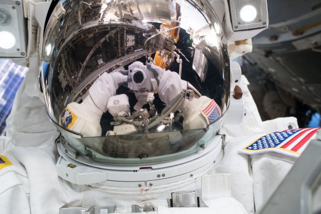 Astronaut Ricky Arnold takes an out-of-this-world selfie, or "space-selfie," during a spacewalk on May 16 to swap thermal control gear.
