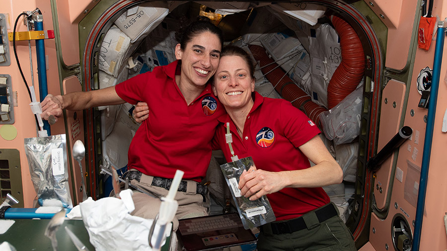 NASA astronauts (from left) Jasmin Moghbeli and Loral O'Hara pose together for a portrait inside the International Space Station's Unity module.