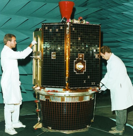 Technicians prepare Clementine for a test in an anechoic chamber prior to shipping to the launch site