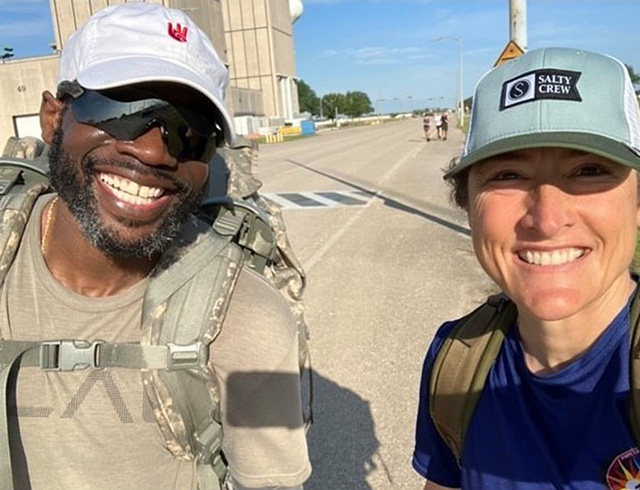 NASA astronaut fitness trainer Corey Twine poses with astronaut Christina Koch out on a run