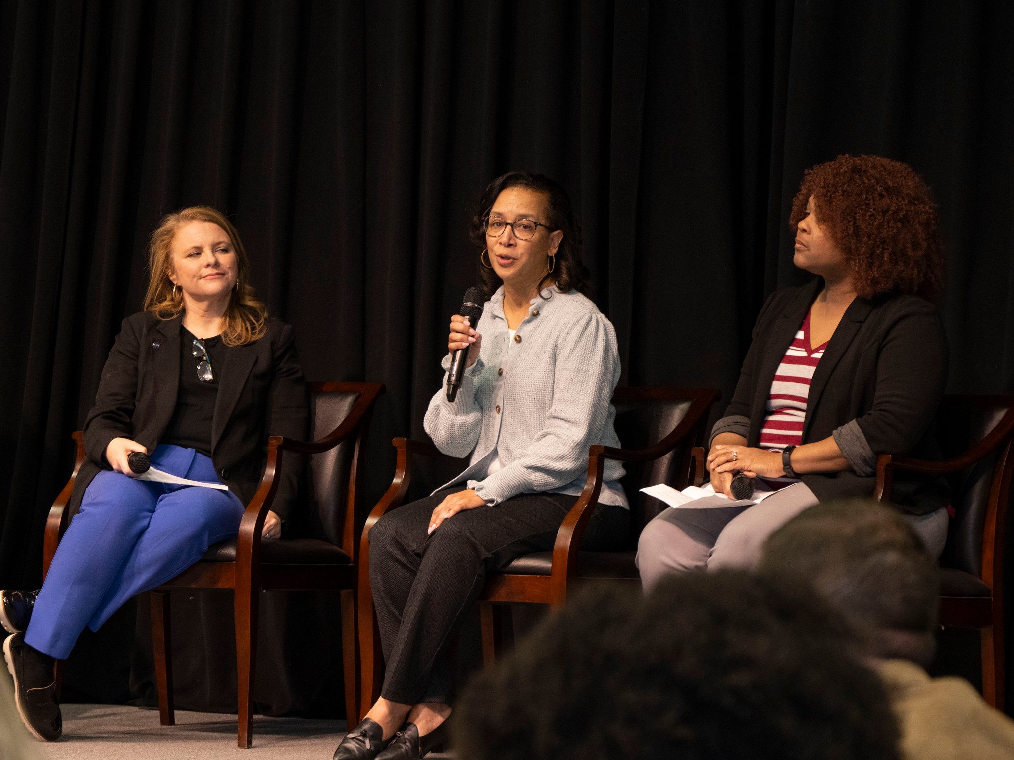 Marshall Space Flight Center Chief Financial Officer Rhega Gordon, center, who participates in the center’s Mentorship Program, discusses the benefits of mentoring and her advice for getting the most out of a mentoring relationship during a panel event held Feb. 6 in Activities Building 4316 as part of Marshall’s celebration of National Mentoring Month. Joining her on stage are two of her mentees, program specialist Kim Henry and Marshall Sustainability Coordinator Malene McElroy.