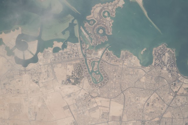 Doha, the capital city of Qatar, was photographed by an Expedition 55 crew member aboard the International Space Station as it orbited over the northeastern coast of the Arabian Peninsula.