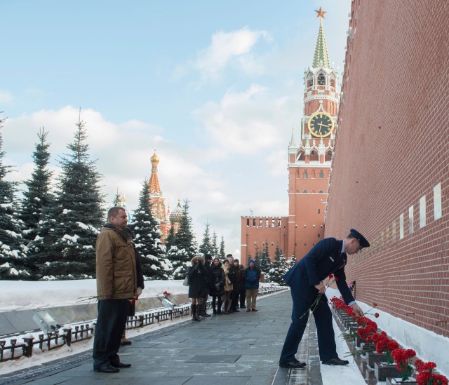 At Red Square in Moscow, Expedition 55 backup crew member Nick Hague of NASA lays flowers at the Kremlin Wall where Russian space icons are interred as part of pre-launch activities Feb. 22. Looking on is crewmate Alexey Ovchinin of Roscosmos (left). They are backups to the prime crew, Drew Feustel of NASA, Oleg Artemyev of Roscosmos and Ricky Arnold of NASA, who will launch March 21 on the Soyuz MS-08 spacecraft from the Baikonur Cosmodrome in Kazakhstan for a five-month mission on the International Space Station.