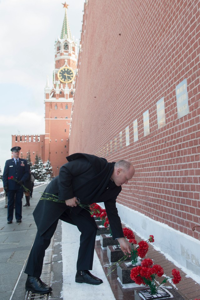 At Red Square in Moscow, Expedition 55 crew member Oleg Artemyev lays flowers at the Kremlin Wall where Russian space icons are interred in traditional pre-launch activities Feb. 22. Artemyev, Drew Feustel of NASA and Ricky Arnold of NASA will launch March 21 on the Soyuz MS-08 spacecraft from the Baikonur Cosmodrome in Kazakhstan for a five-month mission on the International Space Station.