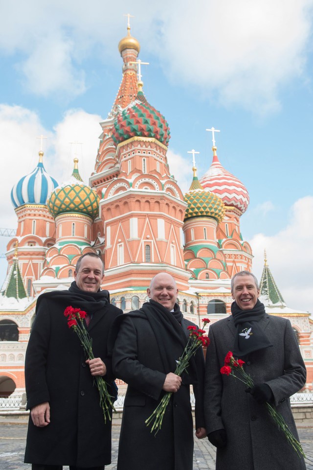 With St. Basil’s Cathedral in Red Square in Moscow serving as a backdrop, Expedition 55 crew members Ricky Arnold of NASA (left), Oleg Artemyev of Roscosmos (center) and Drew Feustel of NASA (right) pose for pictures during traditional pre-launch activities Feb. 22. They will launch March 21 on the Soyuz MS-08 spacecraft from the Baikonur Cosmodrome in Kazakhstan for a five-month mission on the International Space Station.