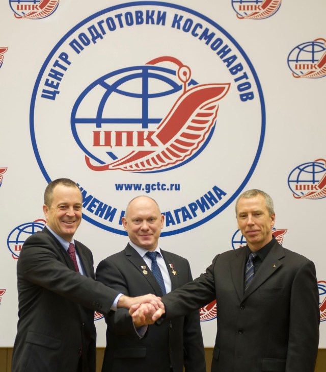 At the Gagarin Cosmonaut Training Center in Star City, Russia, the Expedition 55 prime crew members pose for pictures Feb. 22 following a crew news conference. From left to right are Ricky Arnold of NASA, Oleg Artemyev of Roscosmos and Drew Feustel of NASA, who will launch March 21 on the Soyuz MS-08 spacecraft from the Baikonur Cosmodrome in Kazakhstan for a five-month mission on the International Space Station.