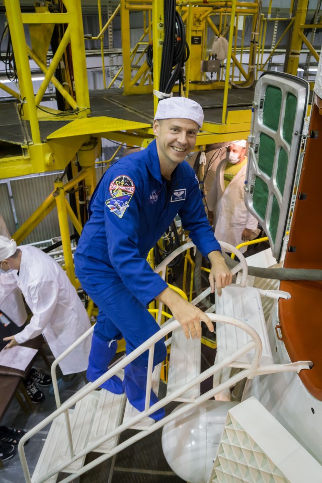At the Baikonur Cosmodrome in Kazakhstan, Expedition 57 crewmember Nick Hague of NASA flashes a smile Oct. 6 as he boards the Soyuz MS-10 spacecraft for a final fit check. Hague and Alexey Ovchinin of Roscosmos will launch Oct. 11 from the Baikonur Cosmodrome on the Soyuz MS-10 spacecraft for a six-month mission on the International Space Station.
