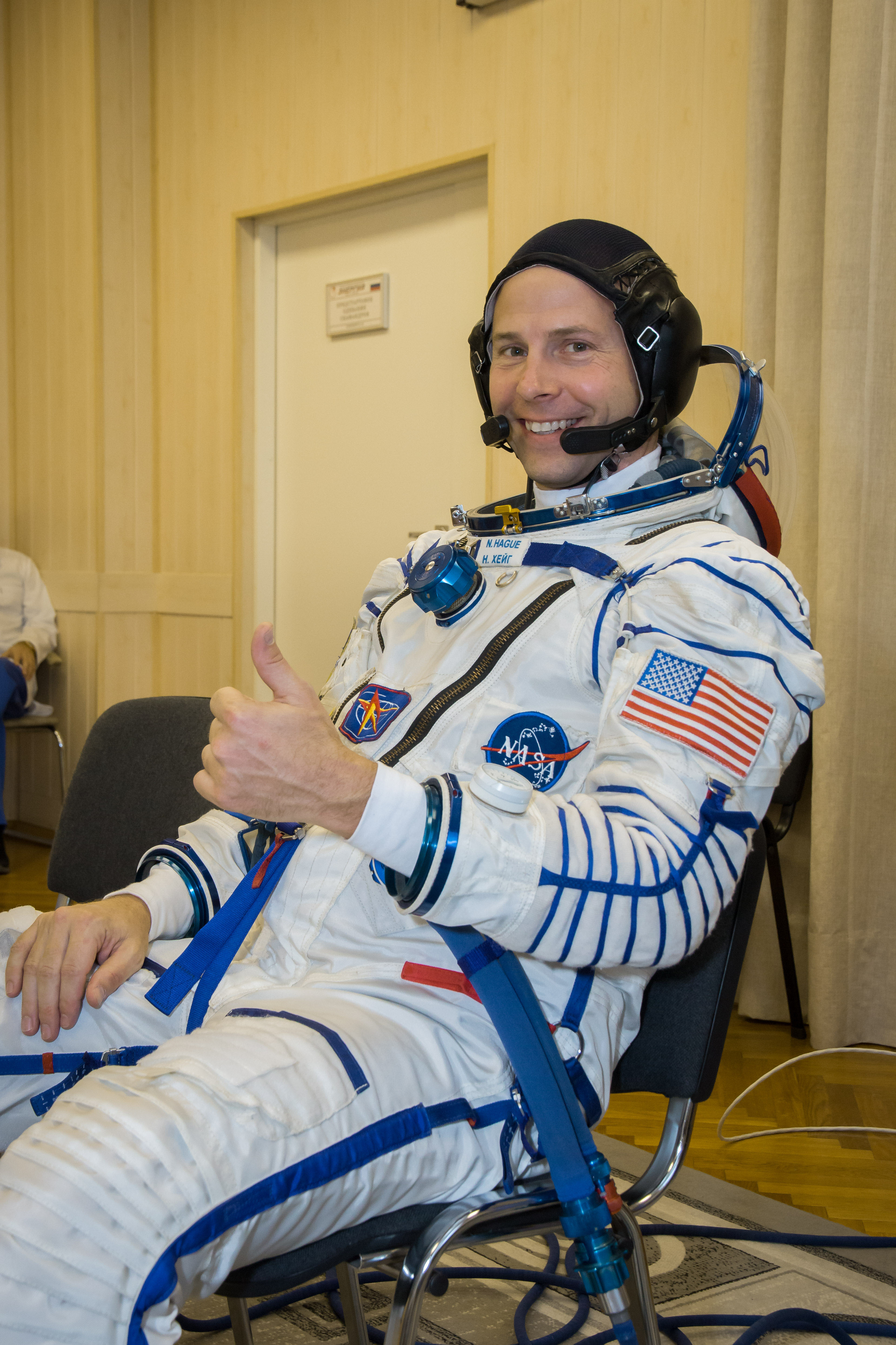 At the Baikonur Cosmodrome in Kazakhstan, Expedition 57 crew member Nick Hague of NASA flashes a thumbs up sign in his Russian Sokol launch and entry suit Sept. 26 during pre-launch training activities. Hague and Alexey Ovchinin of Roscosmos will launch Oct. 11 in the Soyuz MS-10 spacecraft from the Baikonur Cosmodrome for a six-month mission on the International Space Station.