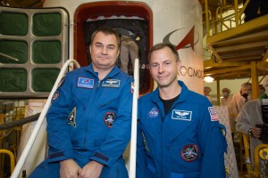 At the Baikonur Cosmodrome in Kazakhstan, Expedition 57 crewmembers Alexey Ovchinin of Roscosmos (left) and Nick Hague of NASA (right) pose for pictures Oct. 6 in front of the Soyuz MS-10 spacecraft. They will launch Oct. 11 from the Baikonur Cosmodrome on the Soyuz MS-10 spacecraft for a six-month mission on the International Space Station.