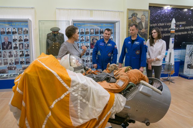 At the Baikonur Cosmodrome Museum in Kazakhstan, Expedition 57 crewmembers Alexey Ovchinin of Roscosmos (left) and Nick Hague of NASA (right) view a mockup of a Soyuz spacecraft seat Oct. 6 as part of a traditional pre-launch tour. Hague and Ovchinin will launch Oct. 11 from the Baikonur Cosmodrome on the Soyuz MS-10 spacecraft for a six-month mission on the International Space Station.