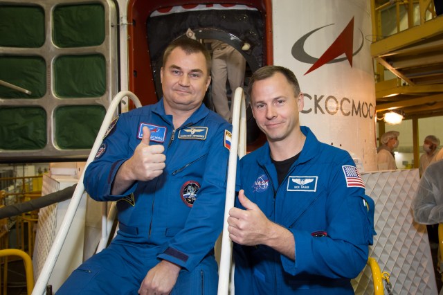 At the Baikonur Cosmodrome in Kazakhstan, Expedition 57 crewmembers Alexey Ovchinin of Roscosmos (left) and Nick Hague of NASA (right) pose for pictures Oct. 6 in front of the Soyuz MS-10 spacecraft. They will launch Oct. 11 from the Baikonur Cosmodrome on the Soyuz MS-10 spacecraft for a six-month mission on the International Space Station.