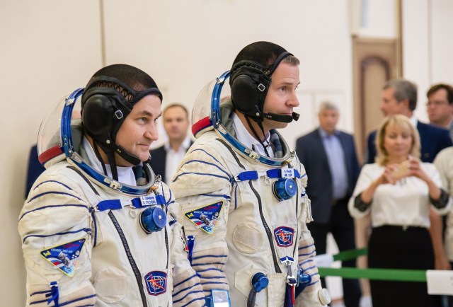 At the Gagarin Cosmonaut Training Center in Star City, Russia, Expedition 57 crew members Alexey Ovchinin of Roscosmos (left) and Nick Hague of NASA (right) report to officials Sept. 14 for the second day of their Soyuz qualification exams. They will launch Oct. 11 on the Soyuz MS-10 spacecraft from the Baikonur Cosmodrome in Kazakhstan for a six-month mission on the International Space Station.