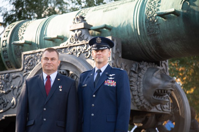 At the Kremlin in Moscow, Expedition 57 crew members Alexey Ovchinin of Roscosmos (left) and Nick Hague of NASA (right) pose for pictures in front of the Tsar Bell Sept. 17 as part of traditional prelaunch activities. Hague and Ovchinin will launch Oct. 11 from the Baikonur Cosmodrome in Kazakhstan on the Soyuz MS-10 spacecraft for a six-month mission on the International Space Station.