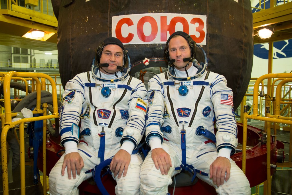 At the Baikonur Cosmodrome in Kazakhstan, Expedition 57 crew members Alexey Ovchinin of Roscosmos (left) and Nick Hague of NASA (right) pose for pictures in front of their Soyuz MS-10 spacecraft Sept. 26 during final pre-launch training. Ovchinin and Hague will launch Oct. 11 in the Soyuz MS-10 from the Baikonur Cosmodrome for a six-month mission on the International Space Station.