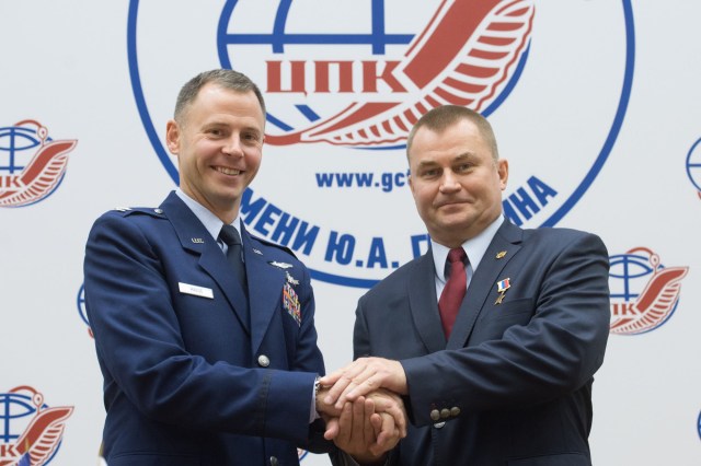 At the Gagarin Cosmonaut Training Center in Star City, Russia, Expedition 57 crew members Nick Hague of NASA (left) and Alexey Ovchinin of Roscosmos (right) pose for pictures Sept. 17 after a crew news conference. Hague and Ovchinin will launch Oct. 11 from the Baikonur Cosmodrome in Kazakhstan on the Soyuz MS-10 spacecraft for a six-month mission on the International Space Station.