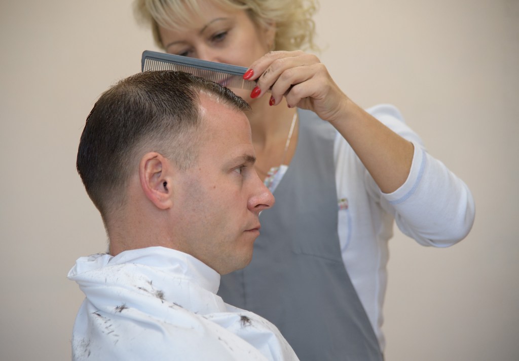 Expedition 57 Flight Engineer Nick Hague of NASA gets his hair cut, Tuesday, Oct. 9, 2018 at the Cosmonaut Hotel in Baikonur, Kazakhstan. Hague and Expedition 57 Flight Engineer Alexey Ovchinin of Roscosmos are scheduled to launch onboard a Soyuz rocket October 11 and will spend the next six months living and working aboard the International Space Station.