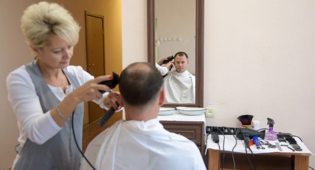 Expedition 57 Flight Engineer Nick Hague of NASA gets his hair cut, Tuesday, Oct. 9, 2018 at the Cosmonaut Hotel in Baikonur, Kazakhstan. Hague and Expedition 57 Flight Engineer Alexey Ovchinin of Roscosmos are scheduled to launch onboard a Soyuz rocket October 11 and will spend the next six months living and working aboard the International Space Station.