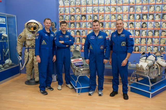 At the Baikonur Cosmodrome Museum in Kazakhstan, the Expedition 57 prime and backup crewmembers pose for photos Oct. 6 as part of their traditional pre-launch tour. From left to right are prime crewmember Nick Hague of NASA, backup crewmember Oleg Kononenko of Roscosmos, prime crewmember Alexey Ovchinin of Roscosmos and backup crewmembers David Saint-Jacques of the Canadian Space Agency. Hague and Ovchinin will launch Oct. 11 from the Baikonur Cosmodrome on the Soyuz MS-10 spacecraft for a six-month mission on the International Space Station.