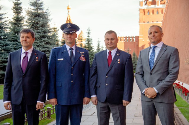 At the Kremlin Wall in Red Square in Moscow, the Expedition 57 prime and backup crew members pose for pictures Sept. 17 during traditional ceremonies. From left to right are backup crew member Oleg Kononenko of Roscosmos,, prime crew members Nick Hague of NASA and Alexey Ovchinin of Roscosmos and backup crew member David Saint-Jacques of the Canadian Space Agency. Hague and Ovchinin will launch Oct. 11 from the Baikonur Cosmodrome in Kazakhstan on the Soyuz MS-10 spacecraft for a six-month mission on the International Space Station.