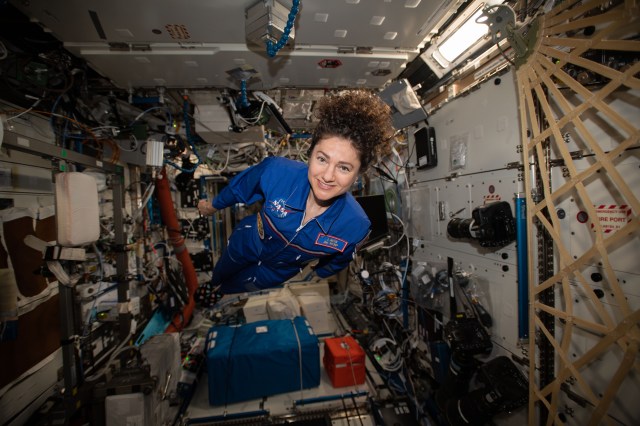 iss062e116102 (March 29, 2020) --- NASA astronaut and Expedition 62 Flight Engineer Jessica Meir hovers for a portrait in the weightless environment of the International Space Station.