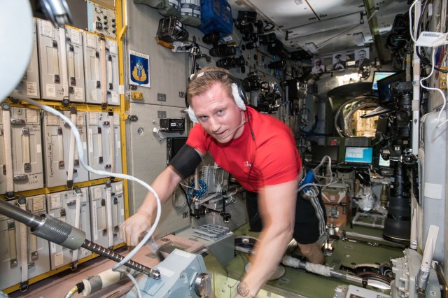 Russian cosmonaut and Expedition 57 Flight Engineer Sergey Prokopyev exercises inside the Zvezda Service Module, part of the International Space Station's Russian segment.