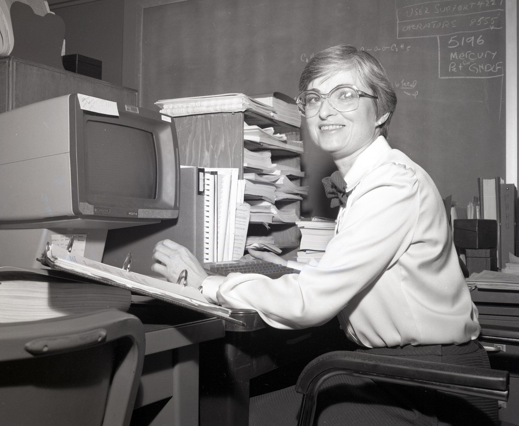 Woman working at computer.