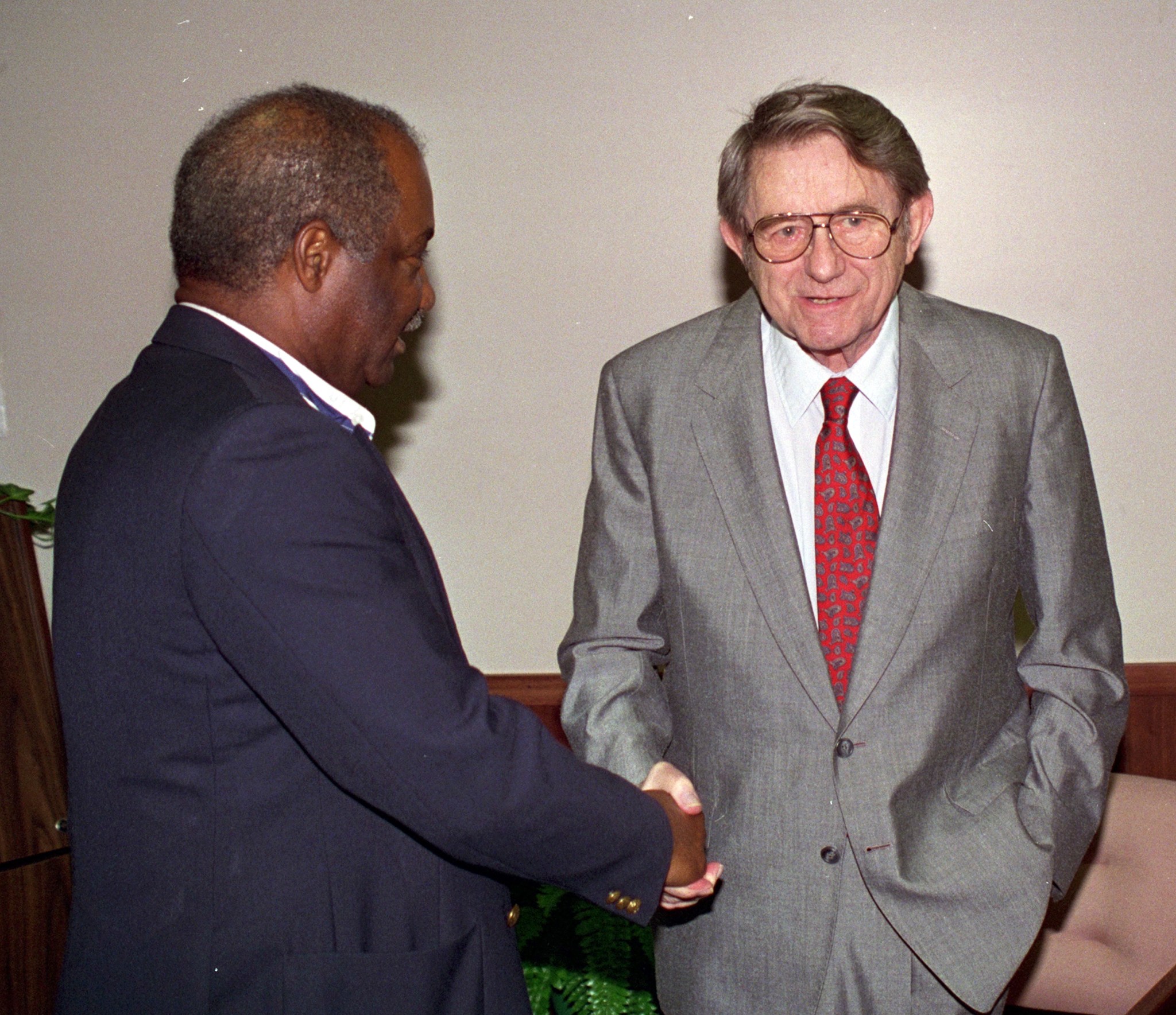 Two men shaking hands.