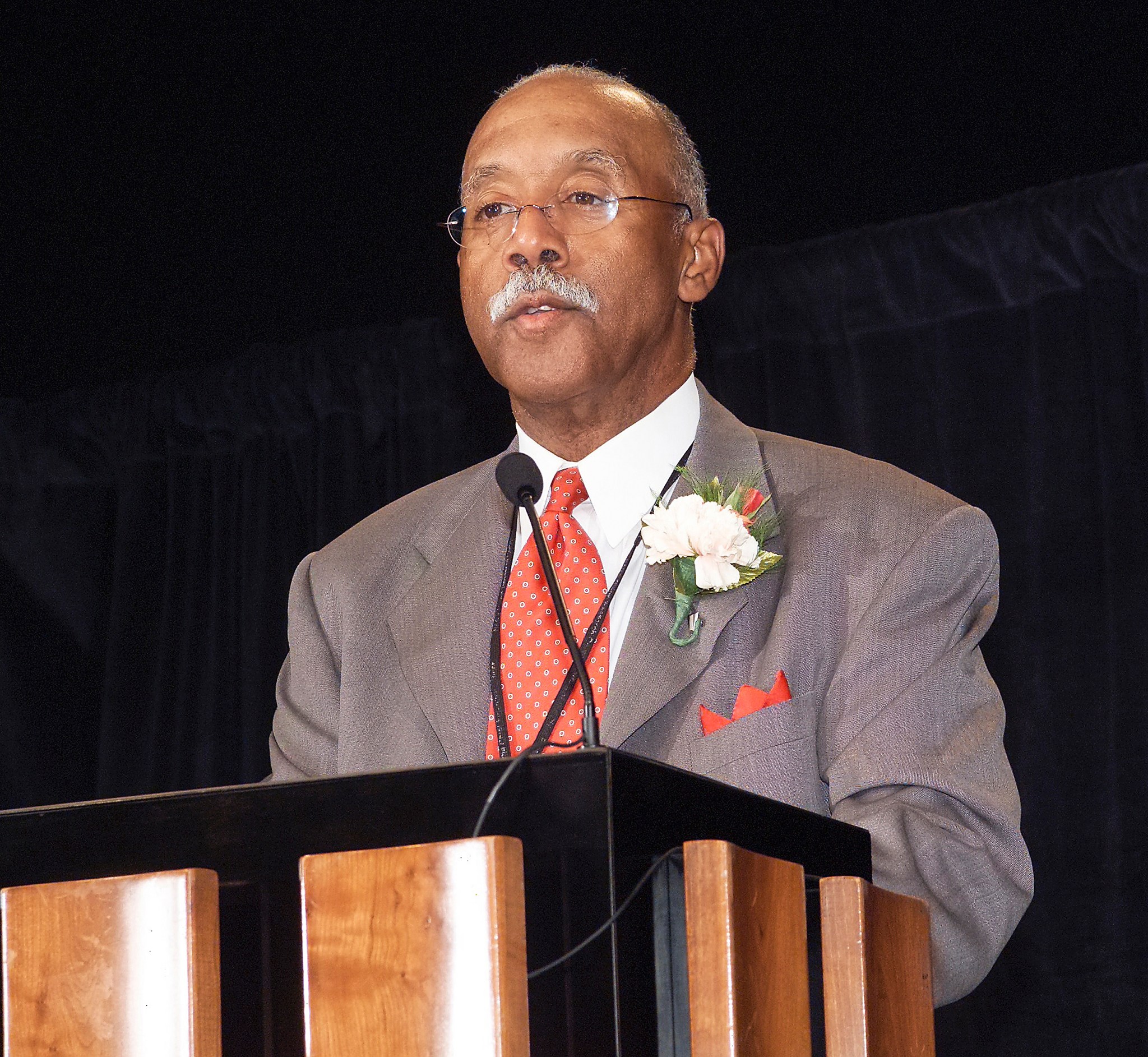 Man speaking at podium