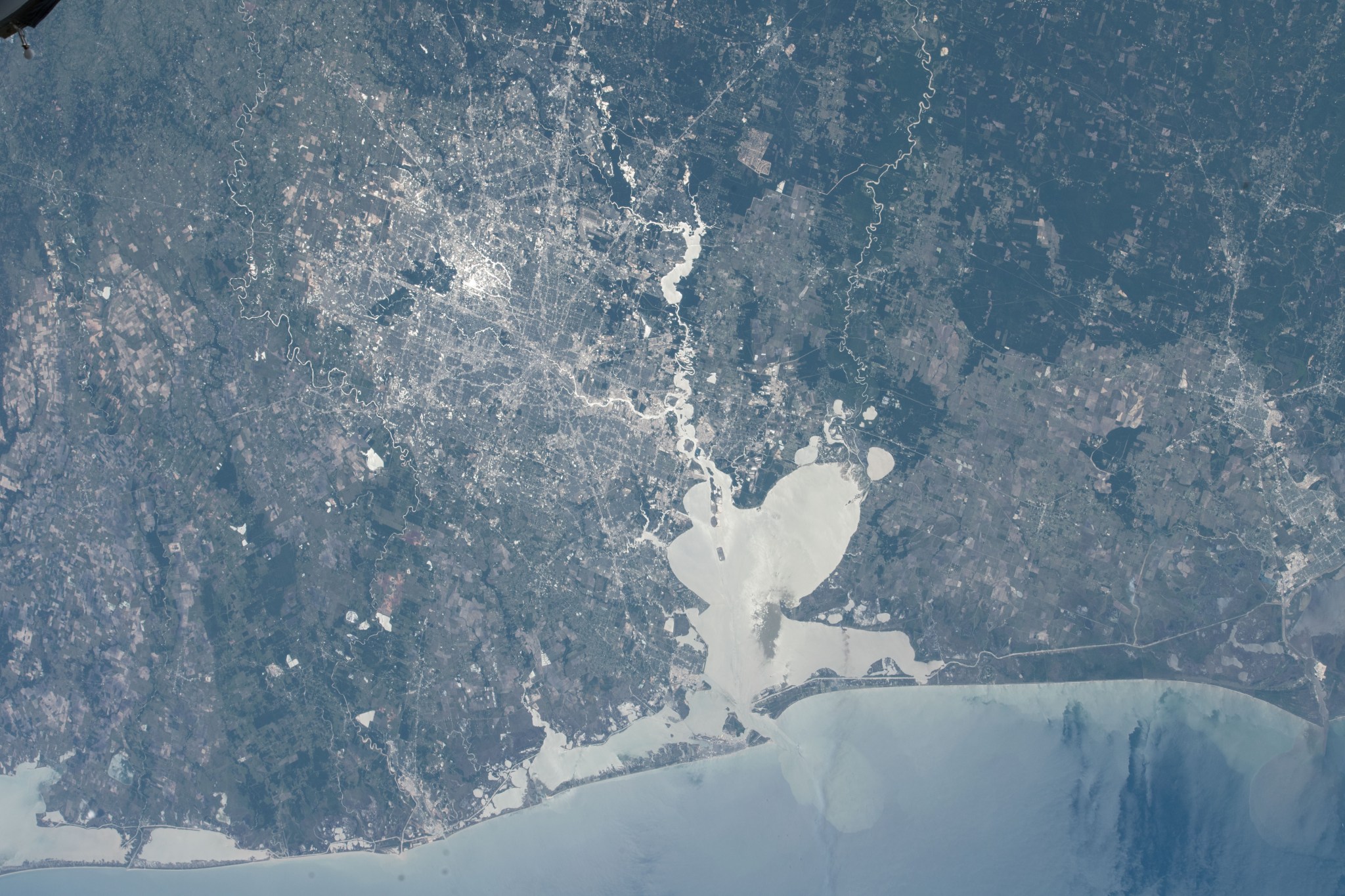 Houston, Texas, the home of NASA's Johnson Space Center, and Galveston Bay are pictured from the space station at an altitude of about 250 miles.